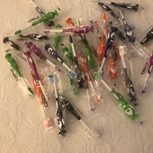 Toothbrush lot 34 total kids
